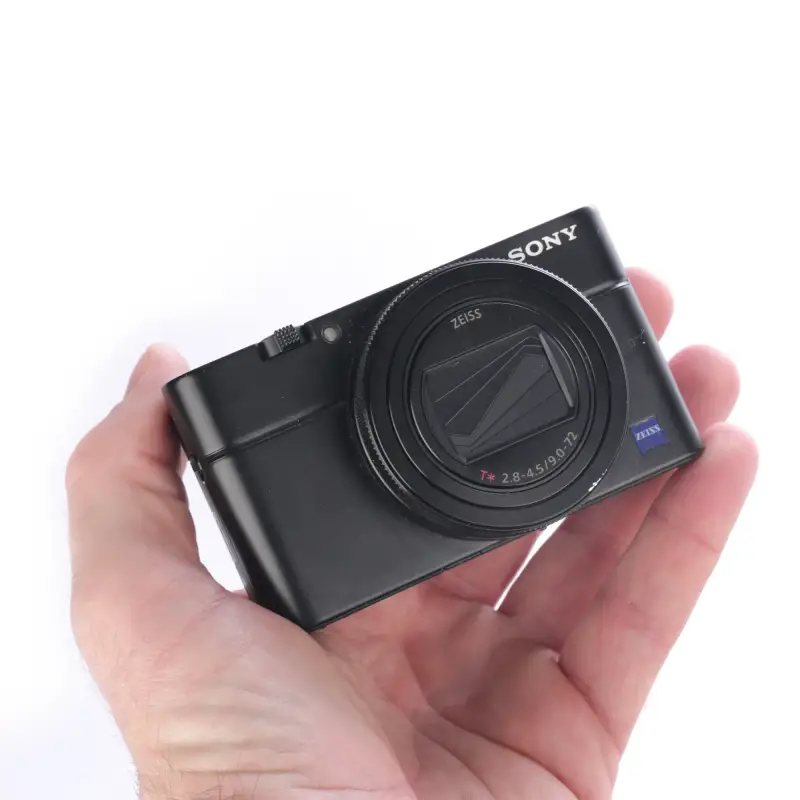 Używany aparat Sony RX100 VII (2941179-J), klatka SmallRig, oryginaly futerał, ładowarka, dodatkowy akumulator Sony