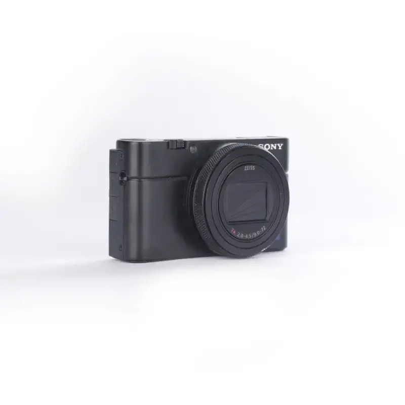 Używany aparat Sony RX100 VII (2941179-J), klatka SmallRig, oryginaly futerał, ładowarka, dodatkowy akumulator Sony