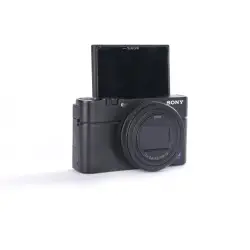 Używany aparat Sony RX100 VII (2941179-J), klatka SmallRig, oryginaly futerał, ładowarka, dodatkowy akumulator Sony