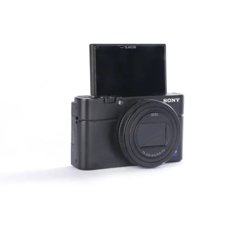 Używany aparat Sony RX100 VII (2941179-J), klatka SmallRig, oryginaly futerał, ładowarka, dodatkowy akumulator Sony