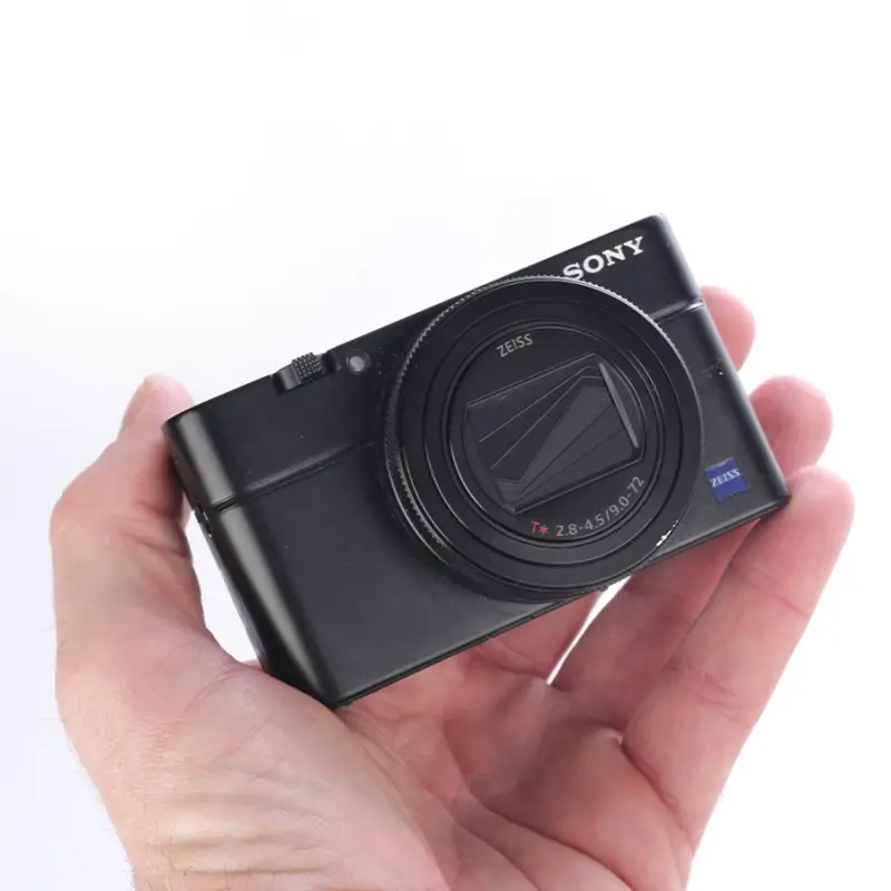 Używany aparat Sony RX100 VII (2941179-J), klatka SmallRig, oryginaly futerał, ładowarka, dodatkowy akumulator Sony