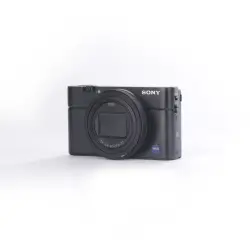 Używany aparat Sony RX100 VII (2941179-J), klatka SmallRig, oryginaly futerał, ładowarka, dodatkowy akumulator Sony