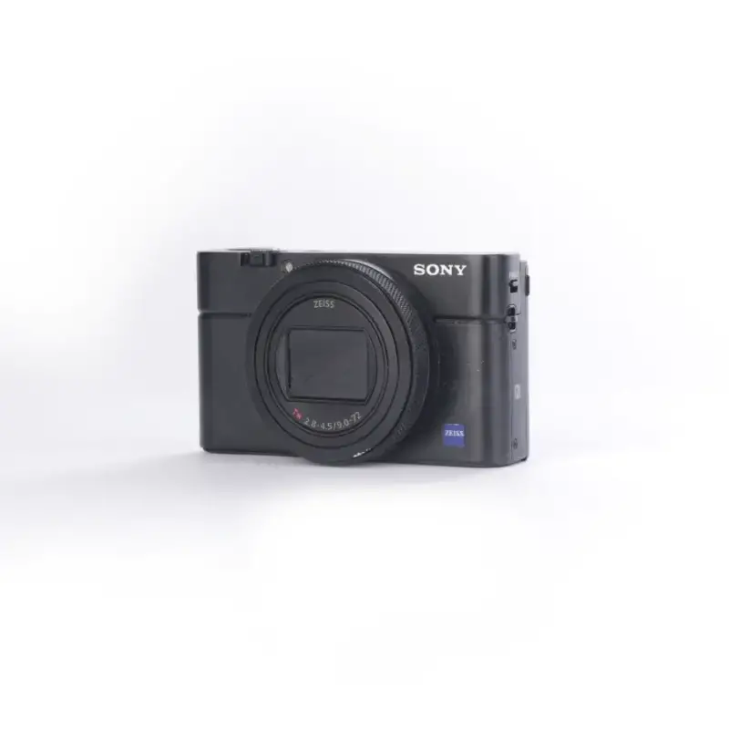 Używany aparat Sony RX100 VII (2941179-J), klatka SmallRig, oryginaly futerał, ładowarka, dodatkowy akumulator Sony