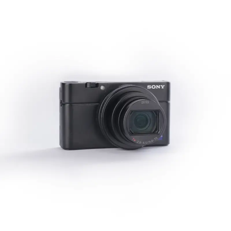 Używany aparat Sony RX100 VII (2941179-J), klatka SmallRig, oryginaly futerał, ładowarka, dodatkowy akumulator Sony